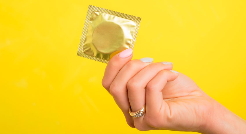 Желтый презерватив